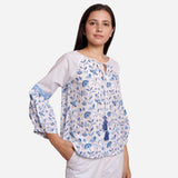 Right View of a Model wearing Blue Block Printed A-Line Cotton Top