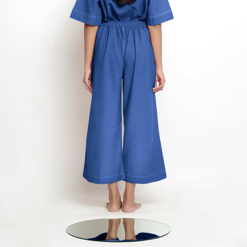 Back View of a Model wearing Powder Blue Vegetable Dyed Wide Legged Pant