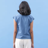 Back View of a Model wearing Blue Vegetable Dyed Handspun Essential Top