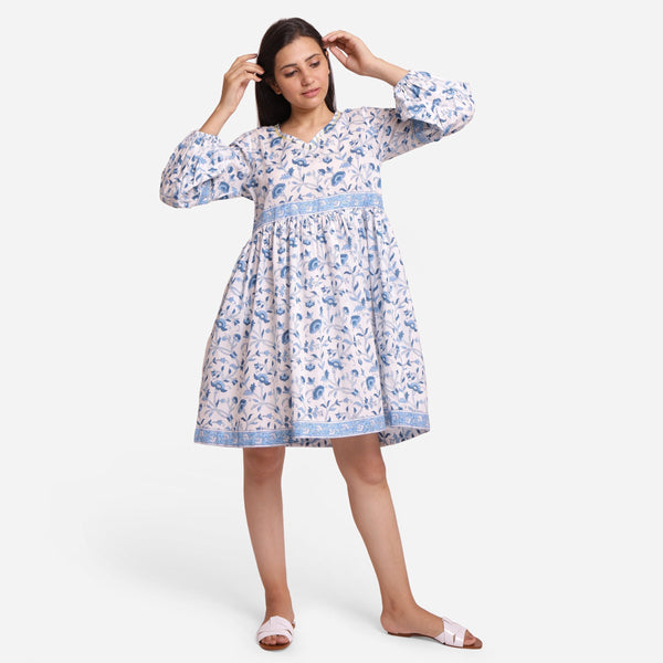 Front View of a Model wearing Blue Floral Fit and Flare Cotton Dress