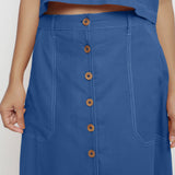 Front Detail of a Model wearing Powder Blue Vegetable Dyed Button-Down Skirt