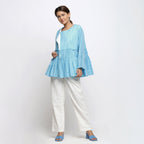Front View of a Model wearing Blue Tie Dyed Anti-Fit Outerwear