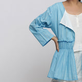 Front View of a Model wearing Blue Tie Dyed Anti-Fit Outerwear