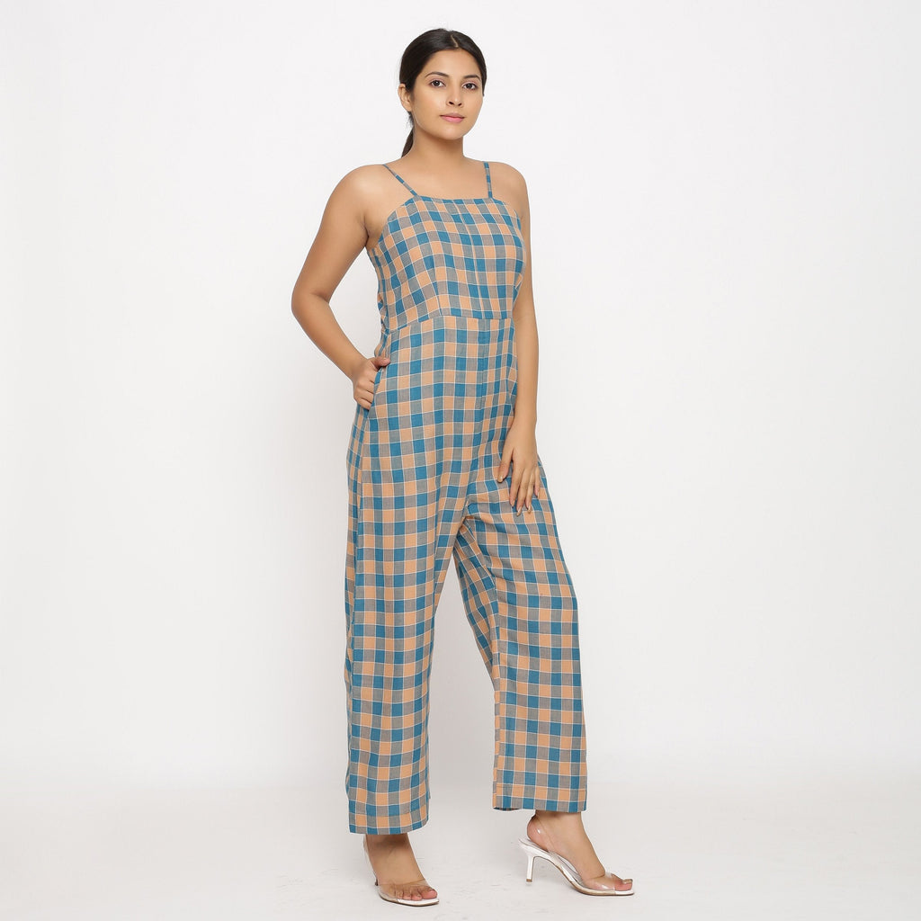 Right View of a Model wearing Bottle Green Handspun Strappy Jumpsuit