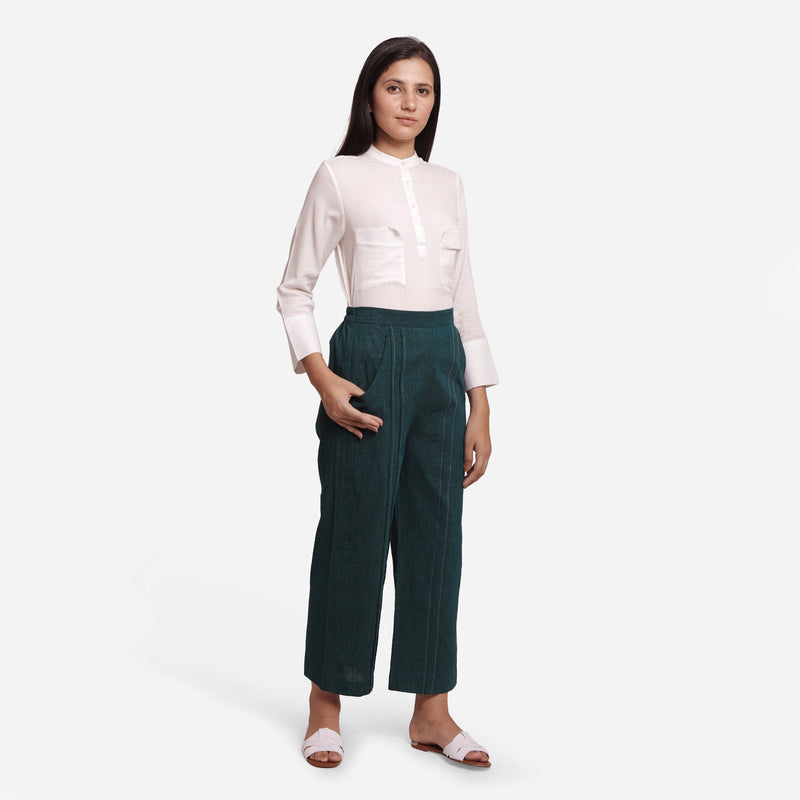 Front View of a Model wearing Bottle Green Mid Rise Straight Fit Pant