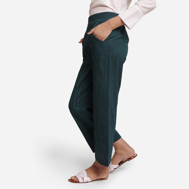 Left View of a Model wearing Bottle Green Mid Rise Straight Fit Pant