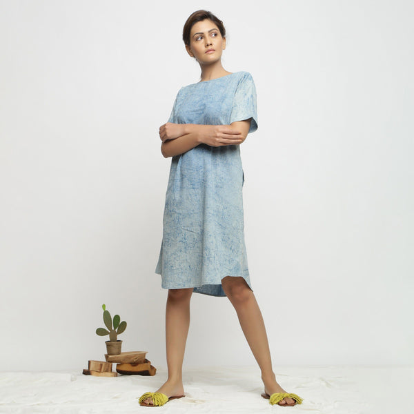 Front View of a Model wearing Blue Dabu Print Hand Embroidered Dress