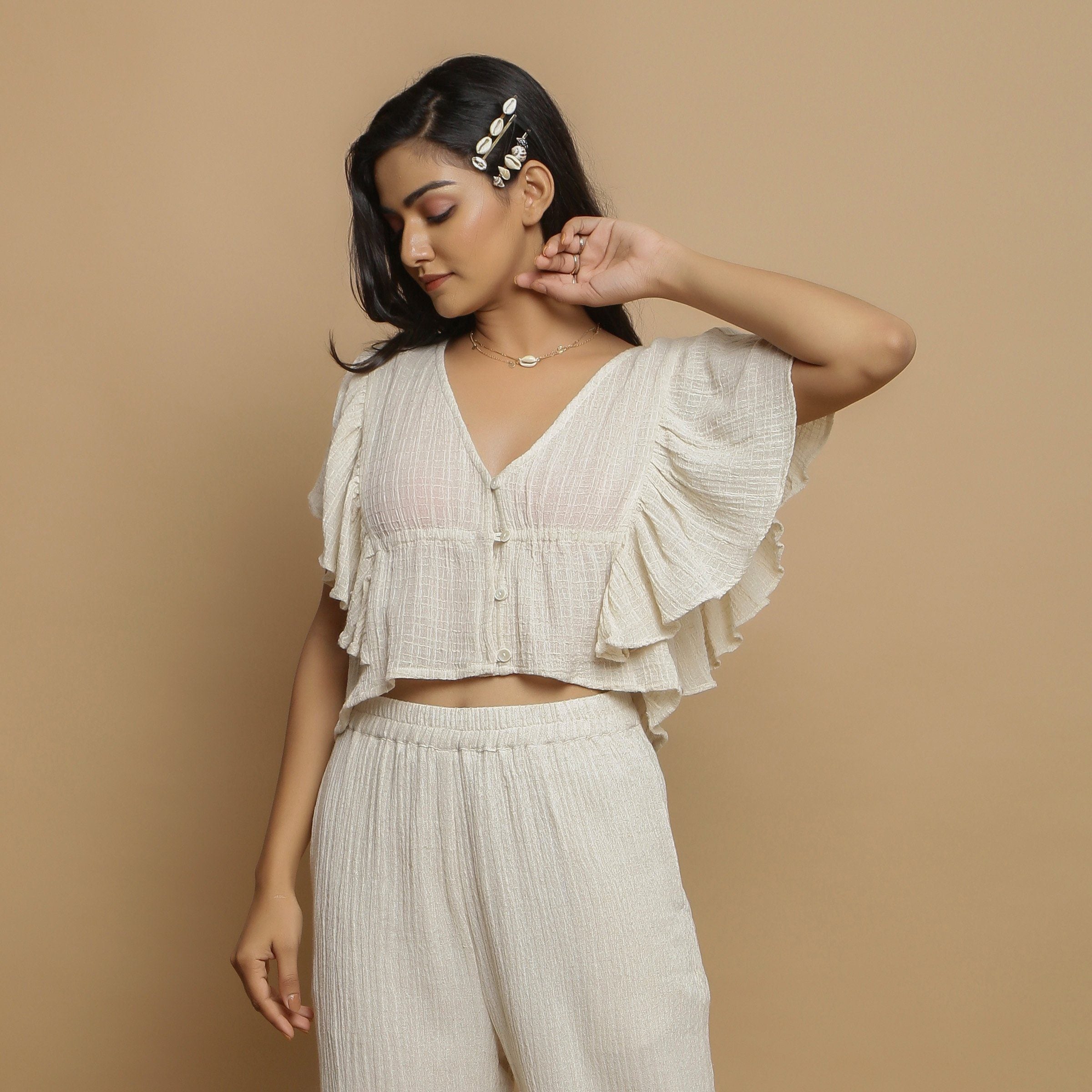 Front View of a Model wearing Breezy Undyed Crop Top and Ecru Pant Set