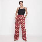 Front View of a Model wearing Brick Red Block Print Wide Legged Pant