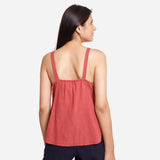 Back View of a Model wearing Brick Red Cotton Spaghetti Strap Top