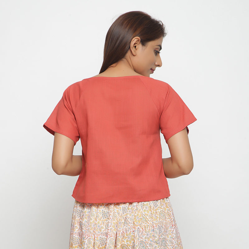 Back View of a Model wearing Brick Red Boat Neck Half Sleeve Cotton Top