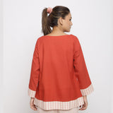 Back View of a Model wearing Brick Red Vegetable Dyed A-line Shirt