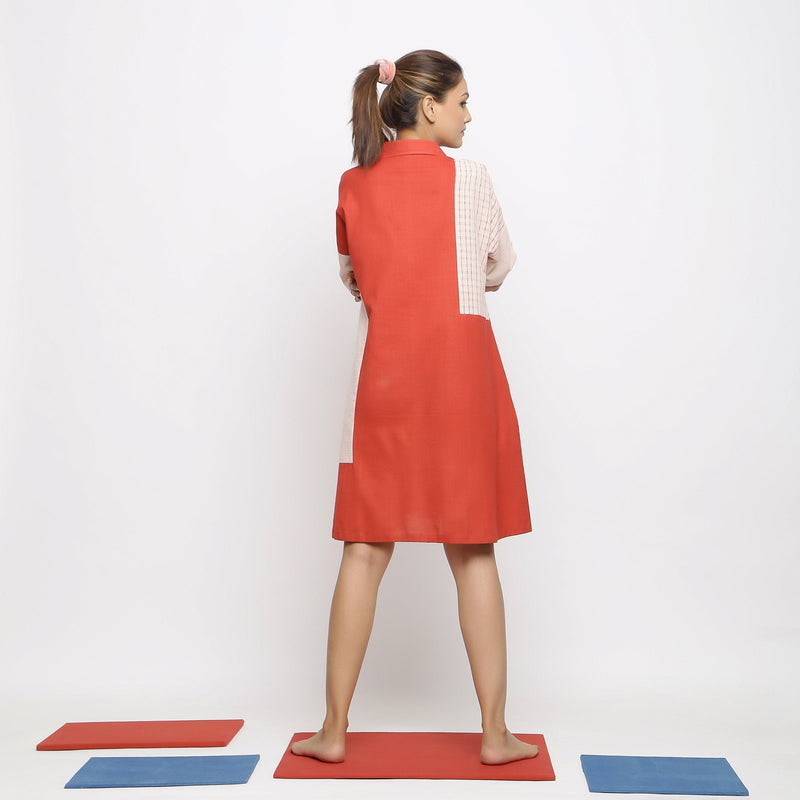 Back View of a Model wearing Brick Red Vegetable Dyed Button-Down Dress