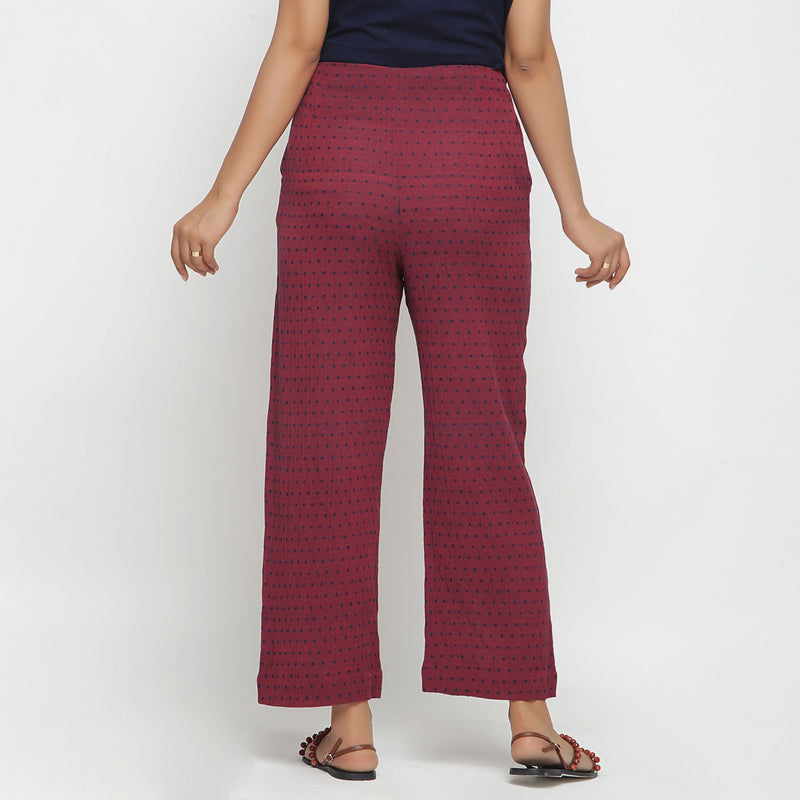 Back View of a Model wearing Red Polka Dots Straight Cotton Pant
