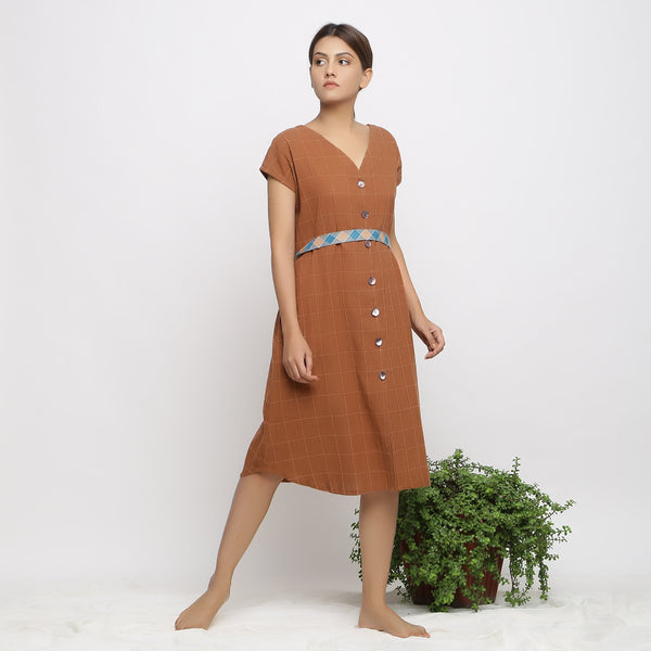 Front View of a Model wearing Brown Handspun V-Neck Shift Dress