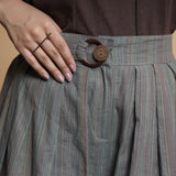 Front Detail of a Model wearing Grey Striped Wide Legged Pleated Pant