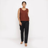 Front View of a Model wearing Brown Straight Top and Solid Black Pant Set