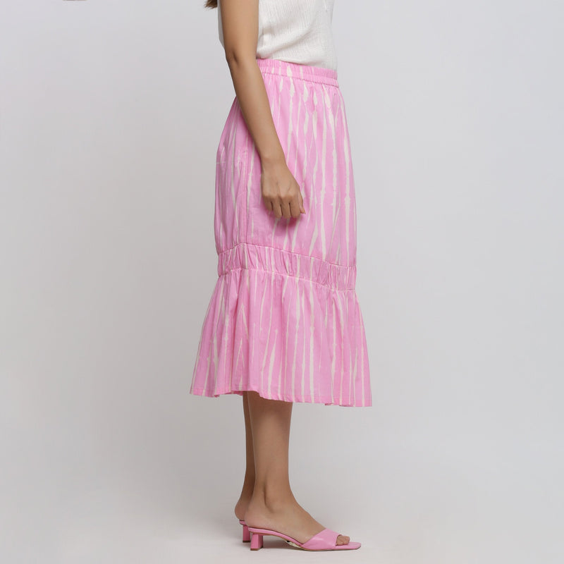 Right View of a Model wearing Bubblegum Pink Tie And Dye Balloon Skirt