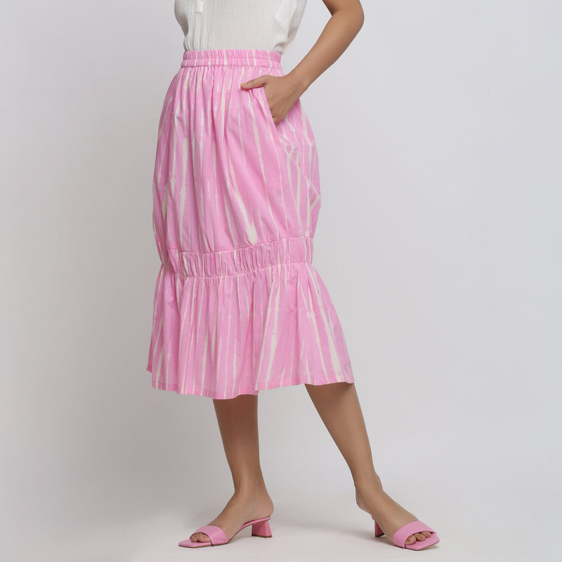 Left View of a Model wearing Bubblegum Pink Tie And Dye Balloon Skirt