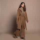 Right View of a Model wearing Camel Brown Cotton Velvet Pant and Jacket Set