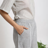 Right View of a Model wearing Checkered Handspun Pull-On Straight Fit Pant