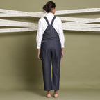 Back View of a Model wearing Classic White Shirt and Indigo Dungaree Set
