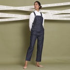 Front View of a Model wearing Classic White Shirt and Indigo Dungaree Set