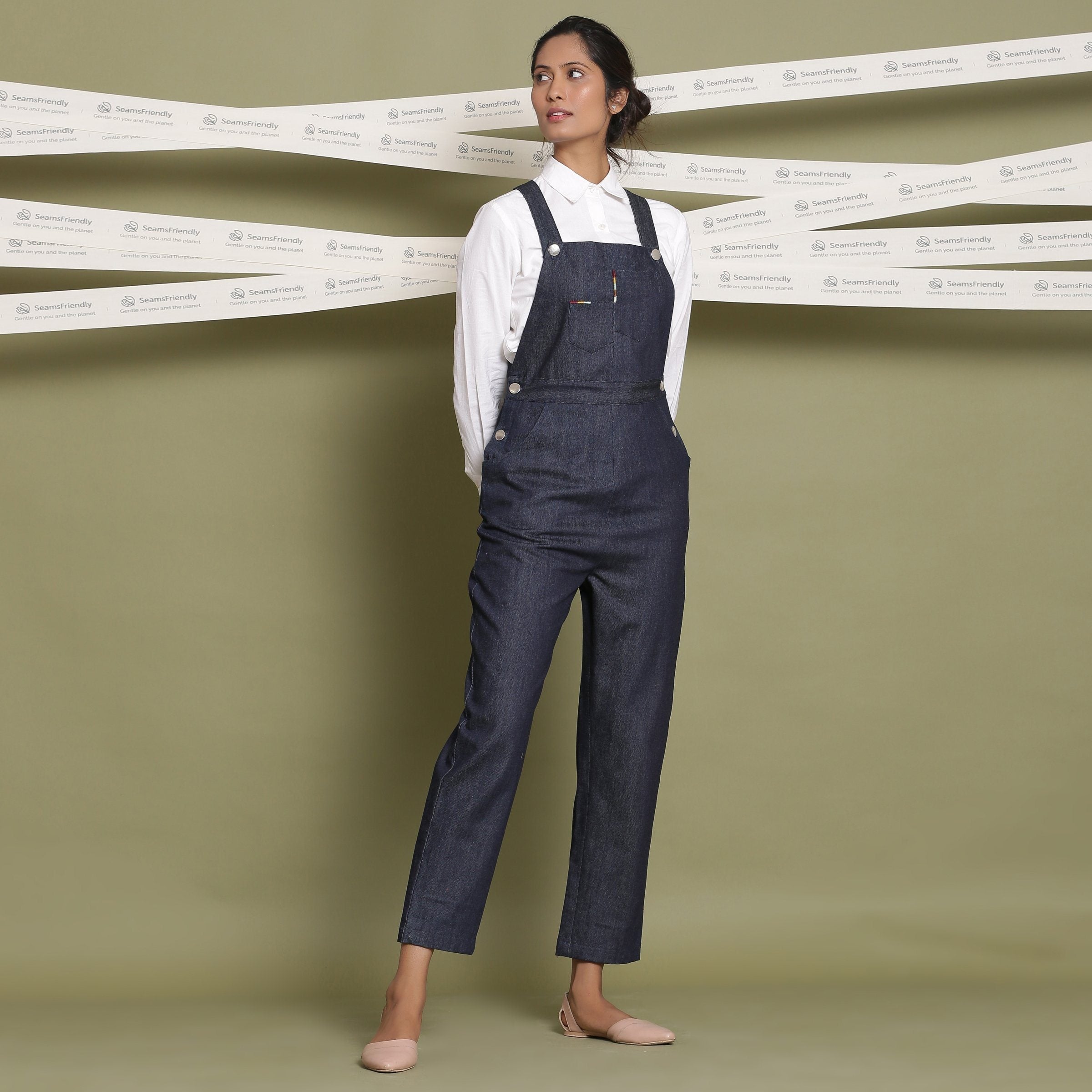 Front View of a Model wearing Classic White Shirt and Indigo Dungaree Set