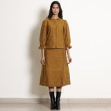 Front View of a Model wearing Classy Golden Oak Shirt and A-Line Skirt Set