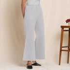 Right View of a Model wearing Cloudy Grey Flannel Cap Sleeve Crop Top