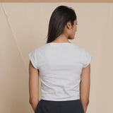 Back View of a Model wearing Cloudy Grey Flannel Cap Sleeve Crop Top