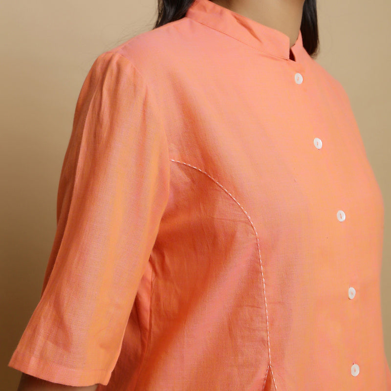 Front Detail of a Model wearing Handwoven Cotton Godet Button-Down Top