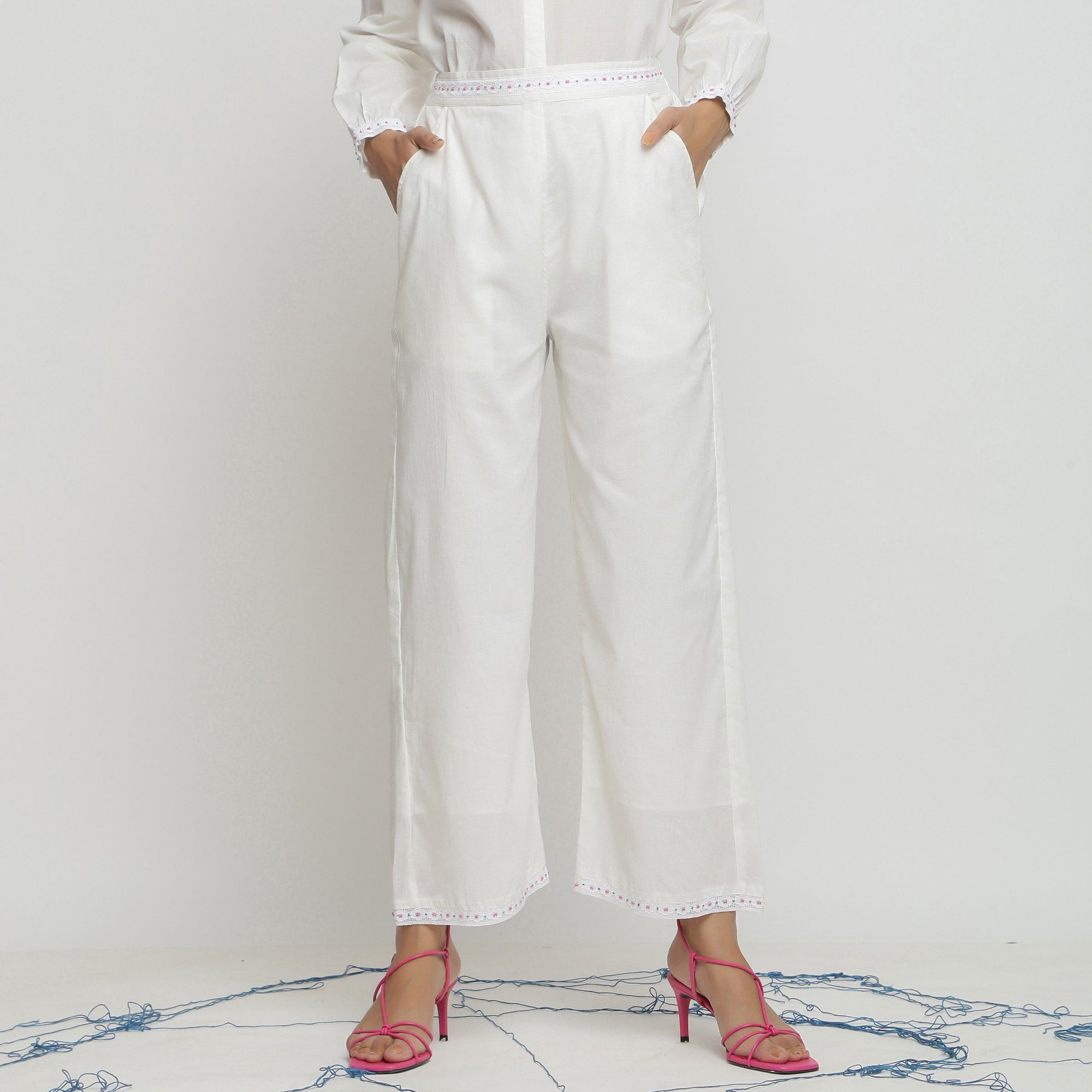 Front View of a Model wearing Solid White Hand Beaded Straight Pant