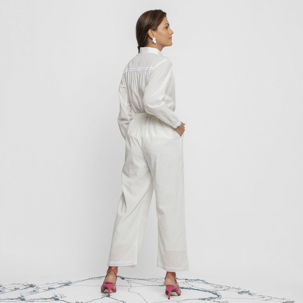 Back View of a Model wearing Crisp White Organic Cotton Top and Pant Set