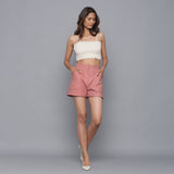 Front View of a Model wearing Pink Flannel Convertible Pant Shorts