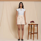Front View of a Model wearing Cotton Beige Striped Paperbag Shorts