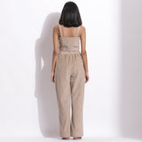 Back View of a Model wearing Taupe Beige Corduroy Wide-Legged Trouser Pant