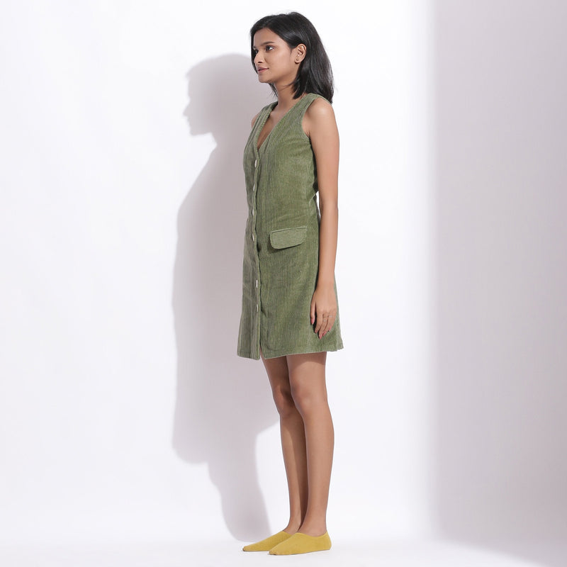 Left View of a Model wearing Cotton Corduroy Green Button-Down Dress