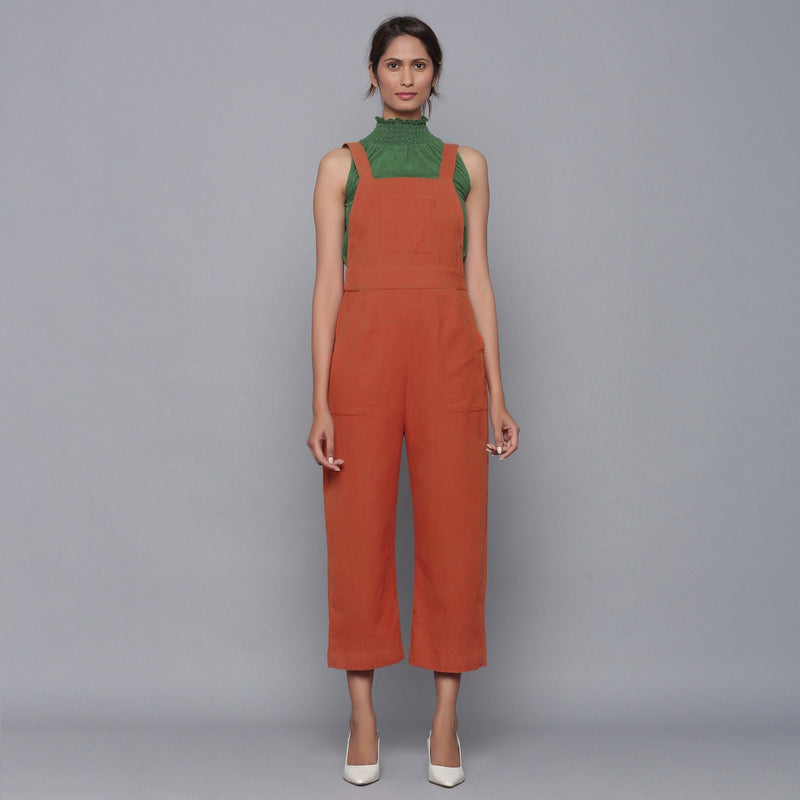 Front View of a Model wearing Sunset Rust Cotton Corduroy Dungaree