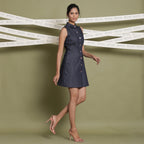 Right View of a Model wearing Cotton Denim Button-Down Shirt Dress