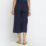Back View of a Model wearing Solid Navy Blue Cotton Flax Culottes