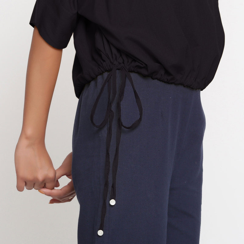 Right Detail of a Model wearing Cotton Flax Black Balloon Top and Culottes Set