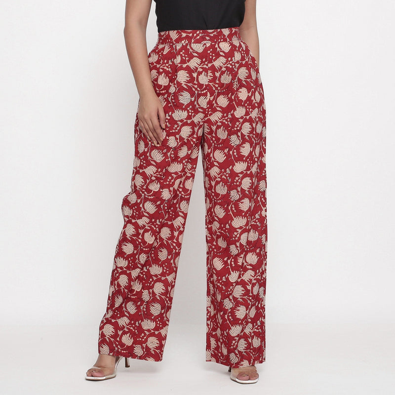 Front View of a Model wearing Brick Red Block Print Wide Legged Pant