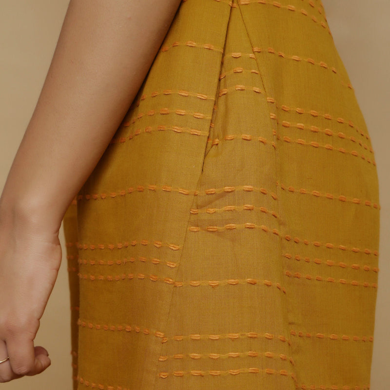 Left Detail of a Model Wearing Striped Handwoven Flared Godet Shorts