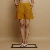 Front View of a Model Wearing Striped Handwoven Flared Godet Shorts