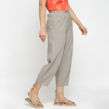 Right View of a Model wearing Yarn Dyed Cotton Beige Paneled Pant