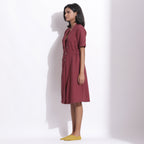 Left View of a Model wearing Cotton Waffle Barn Red Coat Dress