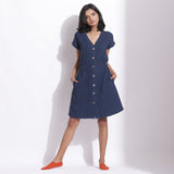 Front View of a Model wearing Cotton Waffle Navy Blue Button-Down Dress