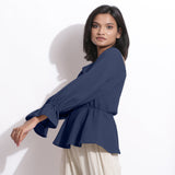 Left View of a Model wearing Cotton Waffle Navy Blue Peplum Top