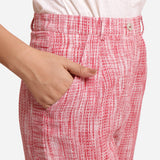 Right Detail of a Model wearing Red Crinkled Cotton Ankle Length Pant